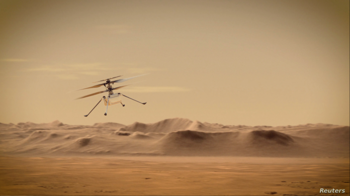 El helicóptero Ingenuity de la NASA vuela sobre Marte en una ilustración del Laboratorio de Propulsión a Chorro de Pasadena, California. Foto: NASA/JPL via Reuters.