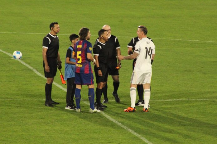 Puyol y Guti Puyol y 'Guti' previo al inicio del juego. Foto cortesía: Rubén Jovel/YSKL.