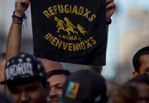 España inicia regularización masiva de migrantes